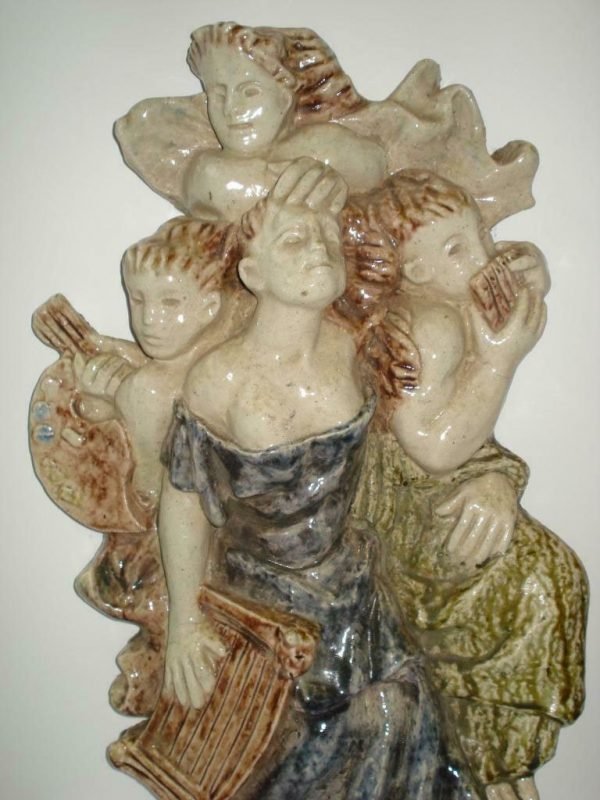 J. Rummens,uitgevoerd in de ateliers van Sint-Joris Beesel (Saint-Georges),Terraco, Apollo en de drie muzen.