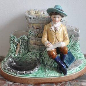 Tabaksstel met tekenende jongen